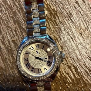 Silver Men's Watch with Roman Numerals.